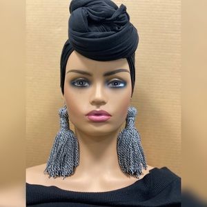 Black and White . Light on the ears . These are hand made earrings